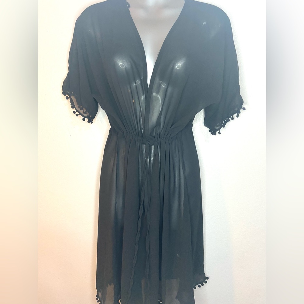 Women’s sheer cover up with drawstring waist. Size M